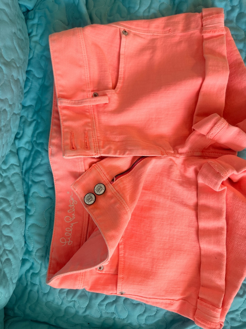 Lilly Pulitzer fluorescent peach shorts.
